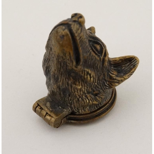 274 - A novelty brass vesta formed as dogs head. 21stC . 1 /4'' long