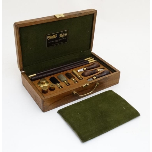 449 - Shooting : A boxed 12 Bore Shotgun Cleaning Kit by William Powell ( Birmingham ) , the walnut case o... 