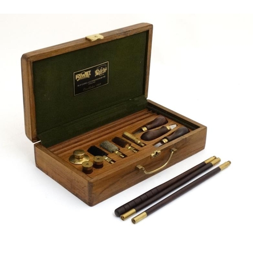 449 - Shooting : A boxed 12 Bore Shotgun Cleaning Kit by William Powell ( Birmingham ) , the walnut case o... 