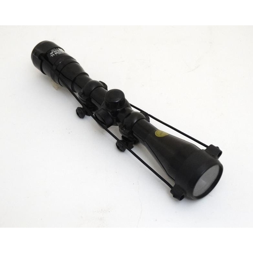 451 - Shooting : An Original ' Model 12 ' Wide Angle 4 x 40 Telescopic Sight for rifle or airgun , having ... 