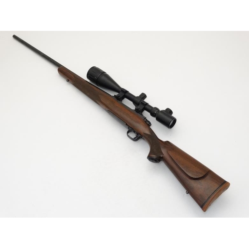 516 - Centrefire Rifle : A Winchester ' Model 70 SA ' .243WIN bolt action Rifle , fitted with a Option Zer... 