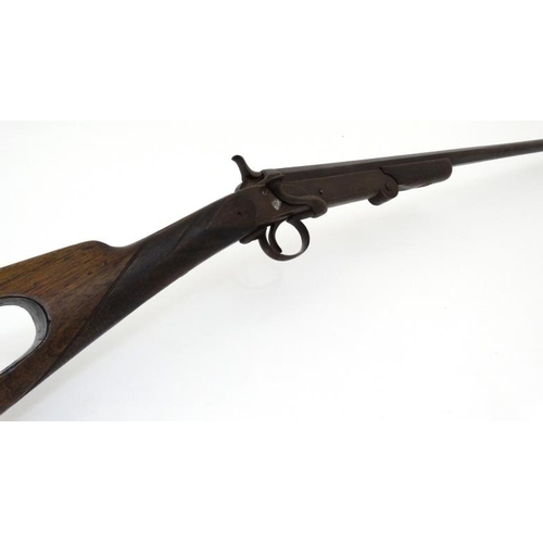 523 - Shotgun : A Belgian .410 folding single barrel Sidelever Hammergun , having a half - octagonal barre... 