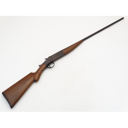 526 - Shotgun : An Iver Johnson .410 single barrel (ejector) Toplever Hammergun , serial number 62527  Ple... 