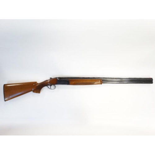 531 - Shotgun : An Aramberri 12 Bore Over & Under (ejector) Shotgun , together with slip . Serial number 1... 