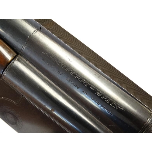 531 - Shotgun : An Aramberri 12 Bore Over & Under (ejector) Shotgun , together with slip . Serial number 1... 