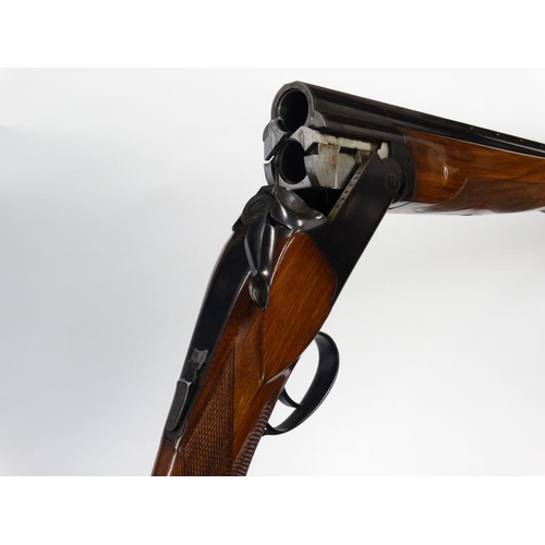 531 - Shotgun : An Aramberri 12 Bore Over & Under (ejector) Shotgun , together with slip . Serial number 1... 