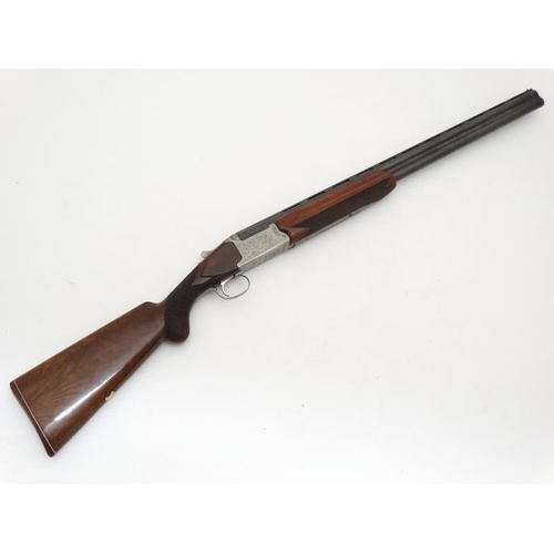 532 - Shotgun : A Nikko ' Model 812 ' 12 Bore Over & Under (ejector) Shotgun , together with slip . Serial... 