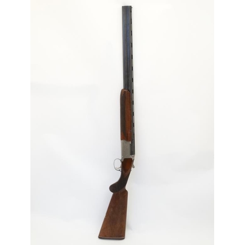 532 - Shotgun : A Nikko ' Model 812 ' 12 Bore Over & Under (ejector) Shotgun , together with slip . Serial... 