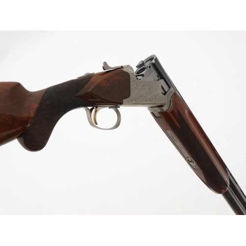 532 - Shotgun : A Nikko ' Model 812 ' 12 Bore Over & Under (ejector) Shotgun , together with slip . Serial... 