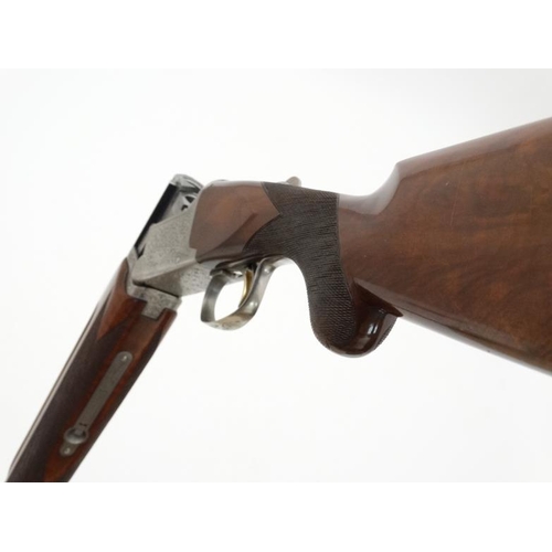 532 - Shotgun : A Nikko ' Model 812 ' 12 Bore Over & Under (ejector) Shotgun , together with slip . Serial... 