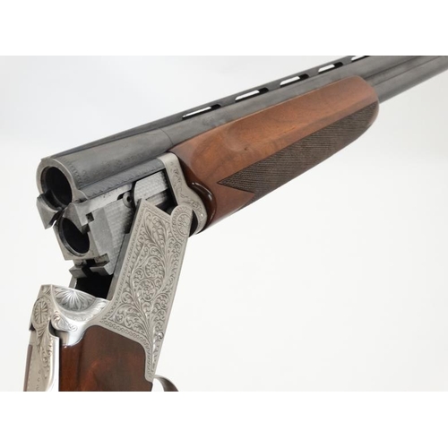 532 - Shotgun : A Nikko ' Model 812 ' 12 Bore Over & Under (ejector) Shotgun , together with slip . Serial... 