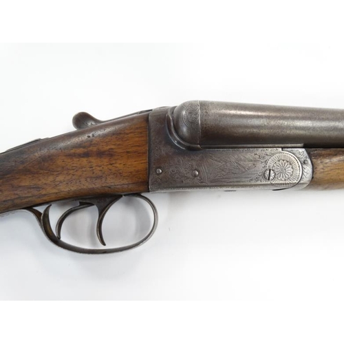 563 - Shotgun : A BSA / S R Jeffery & Son 12 Bore Side by Side boxlock Shotgun , the action finely engrave... 