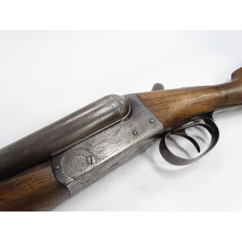 563 - Shotgun : A BSA / S R Jeffery & Son 12 Bore Side by Side boxlock Shotgun , the action finely engrave... 