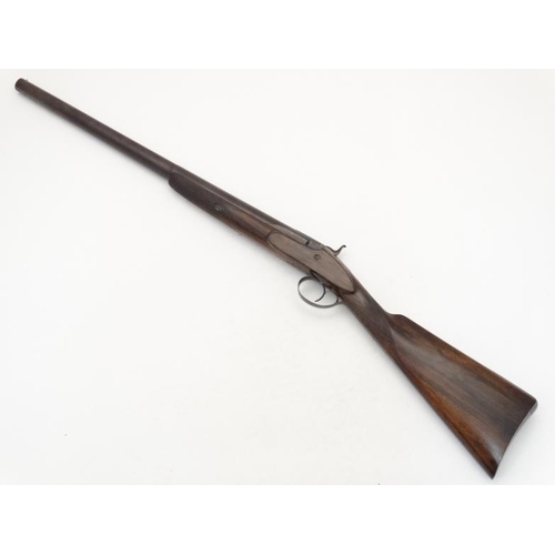 566 - Shotgun : A Rowntree 6 Bore single barrel Percussion Muzzleloading Hammergun , having a 25 3/4'' bla... 