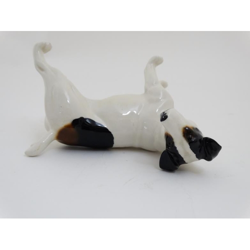 80 - A Beswick Model of a Tri-coloured Jack Russell (standing) , bears Beswick stamp to base. 5'' high.