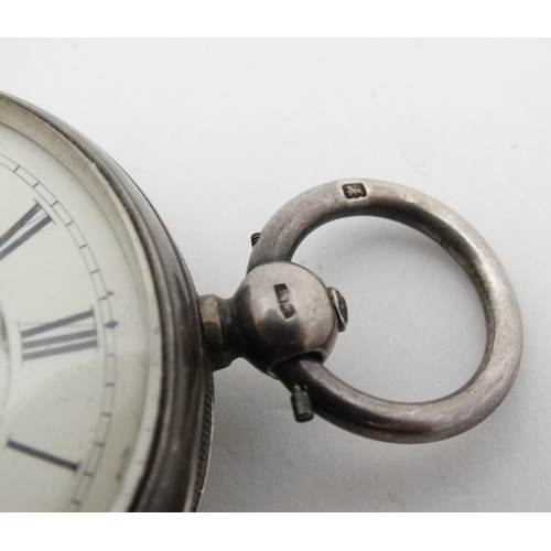 1013 - Pocket Watch : A silver cased Key wind Pocket watch having a silver dial with inset seconds dial at ... 