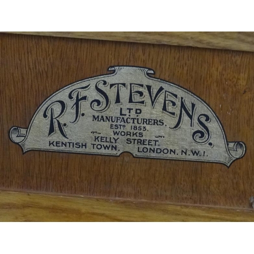 1023 - Musical Instruments : An unusual early 20thC Portable Organ by R F Stevens Ltd , Kentish Town , Lond... 