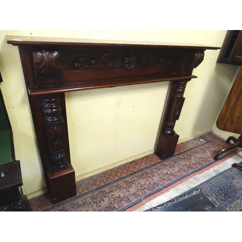 1029 - A stained mahogany fire surround 56'' x 48 1/2'' high x, the top 8 3/4'' deep