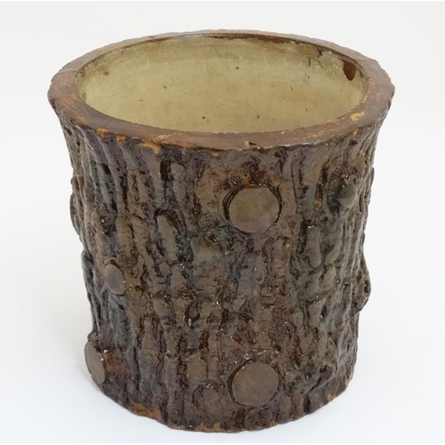 1031A - A Victorian stoneware planter pot with realistic glaze formed as a large log  / cut branch and stand... 