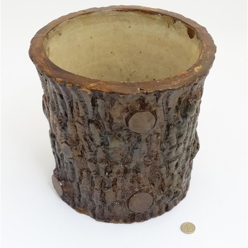 1031A - A Victorian stoneware planter pot with realistic glaze formed as a large log  / cut branch and stand... 