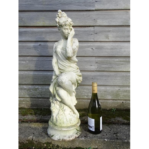 1040 - A white painted reconstituted stone statue depicting a female figure. Approx 26'' high