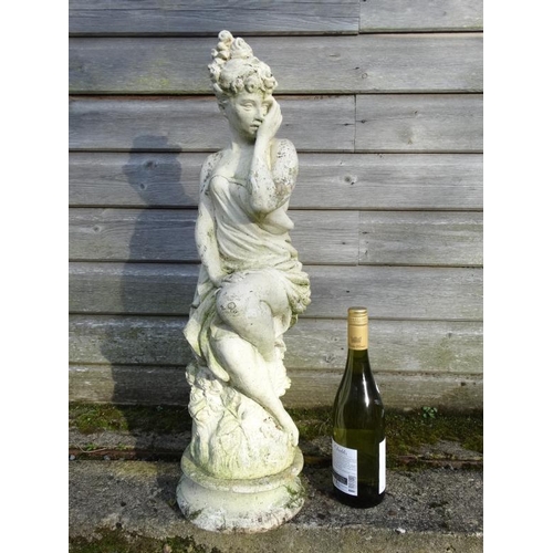 1040 - A white painted reconstituted stone statue depicting a female figure. Approx 26'' high