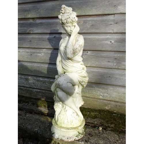 1040 - A white painted reconstituted stone statue depicting a female figure. Approx 26'' high