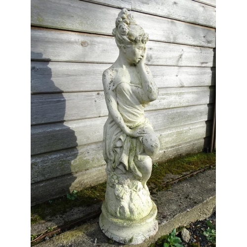 1040 - A white painted reconstituted stone statue depicting a female figure. Approx 26'' high