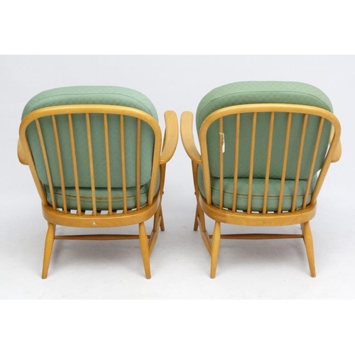 112 - Vintage Retro :   A pair of British blonde wood Windsor Armchaîrs with Ercol blue sticker verso.