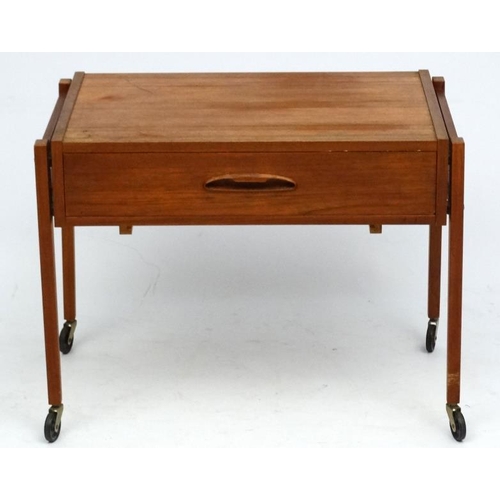 117 - Vintage Retro : A near pair  of Danish teak bedside cabinets / trolleys with frieze drawers , approx... 