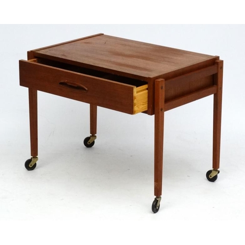 117 - Vintage Retro : A near pair  of Danish teak bedside cabinets / trolleys with frieze drawers , approx... 