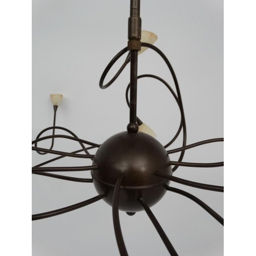 121 - Mid Century : a patinated bronze finish ceiling light , a Spider Ceiling Lamp ,  having 15 arms, 54'... 