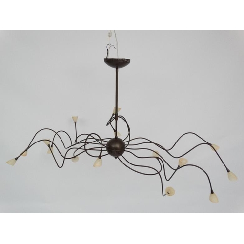 121 - Mid Century : a patinated bronze finish ceiling light , a Spider Ceiling Lamp ,  having 15 arms, 54'... 