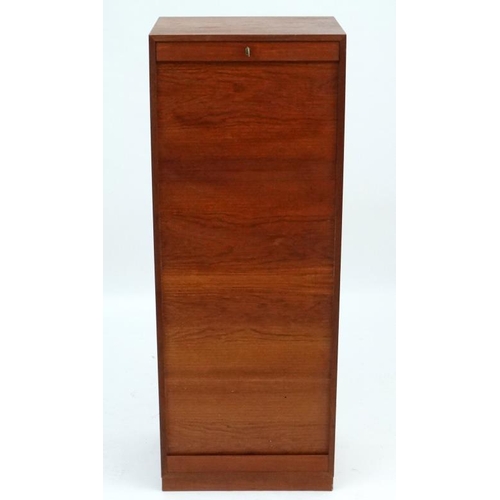 126 - Vintage Retro : a Danish Teak tambour front cabinet opening to reveal 3 open sections , 20'' wide x ... 