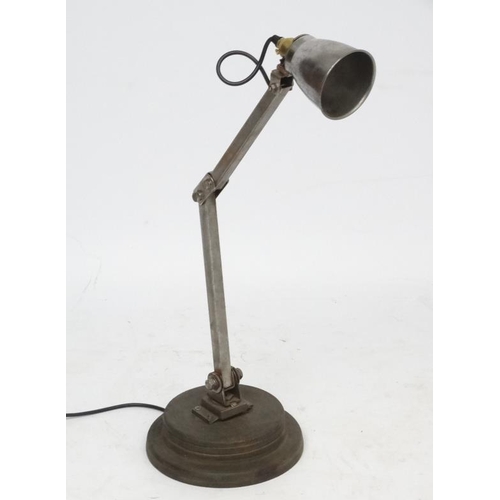 146 - Vintage Industrial  :  a Machinist's lamp standing on a turned circula base, with steel shade.