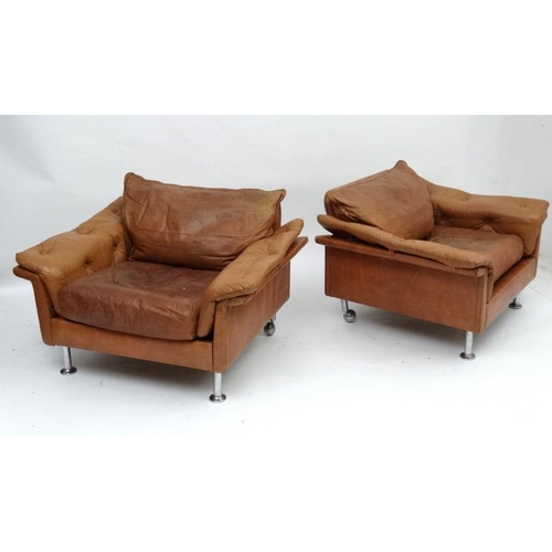 154 - Vintage Retro :a pair Pair of Swedish ' Dux ' tan leather (button back arms and seat) armchairs stan... 