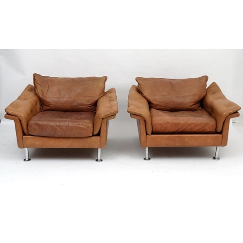 154 - Vintage Retro :a pair Pair of Swedish ' Dux ' tan leather (button back arms and seat) armchairs stan... 