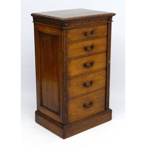 156 - Edwards & Roberts : A late 19thC oak Wellington chest of 5 graduated drawers ( stamped to top) 42'' ... 