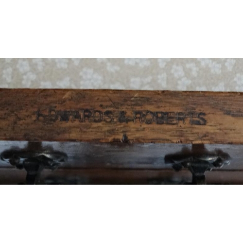 156 - Edwards & Roberts : A late 19thC oak Wellington chest of 5 graduated drawers ( stamped to top) 42'' ... 