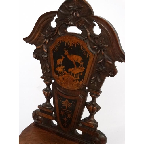 157 - Black Forest : A 4-air musical seated chair with carved edelweiss and inlaid chamois decoration 37 1... 