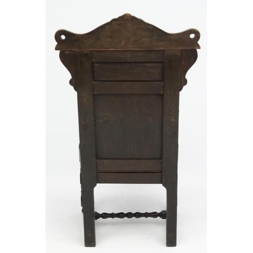 160 - A 19thC carved oak Wainscot chair 49'' high overall.