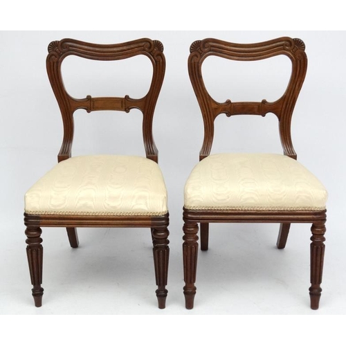 164 - Gillows of Lancaster : A pair of c.1835  mahogany dining chairs with watered silk overstuffed seats.... 