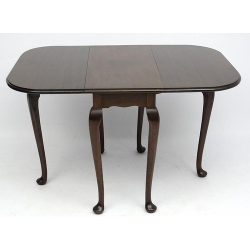 164A - A c1900 mahogany 6-leg drop flap dining table with pad feet in the Queen Anne style 35 1/4'' wide x ... 