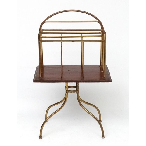 165 - An Edwardian brass and mahogany four legged Canterbury / magazine rack. 37'' high x 13 1/2'' wide x ... 