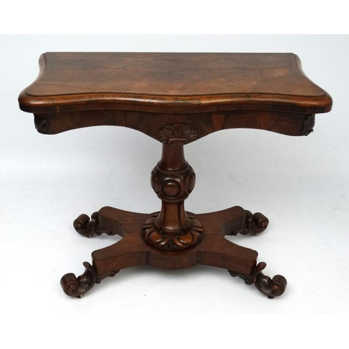 172 - A mid 19thC Rosewood serpentine fronted fold over tea table of pedestal form on a four footed base 3... 