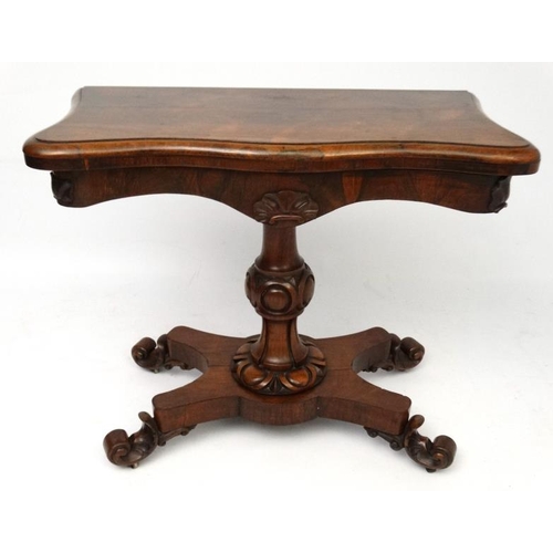 172 - A mid 19thC Rosewood serpentine fronted fold over tea table of pedestal form on a four footed base 3... 