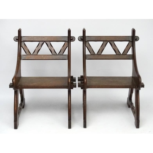 175 - Arts & Crafts : A pair of c.1900  Pugin inspired oak open chairs 38'' high x 27 1/2'' wide