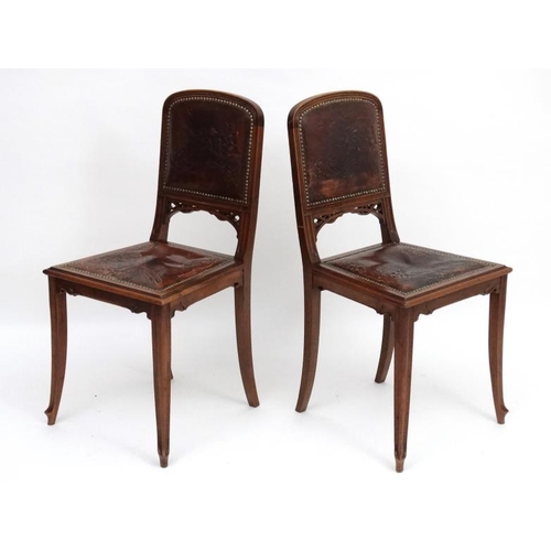 178 - Art Nouveau : Manner of Gailliard , a pair of Continental walnut salon chairs  with embossed leather... 