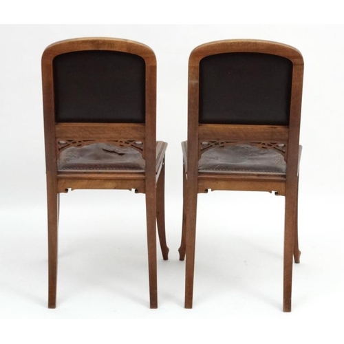 178 - Art Nouveau : Manner of Gailliard , a pair of Continental walnut salon chairs  with embossed leather... 