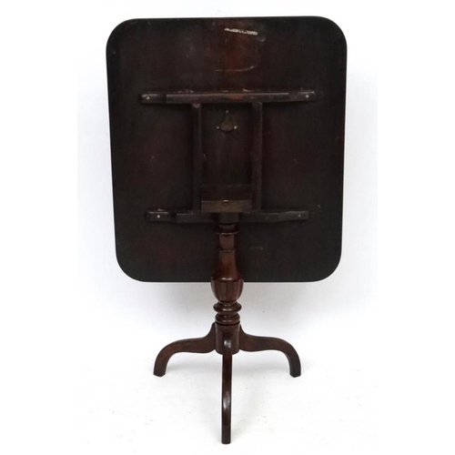 181 - A Georgian mahogany square topped tilt top tripod table 30 1/4'' x 34 1/2''